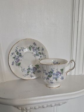 vintage bone china teacup and saucer set in the "Forget-Me-Not" pattern  Paragon